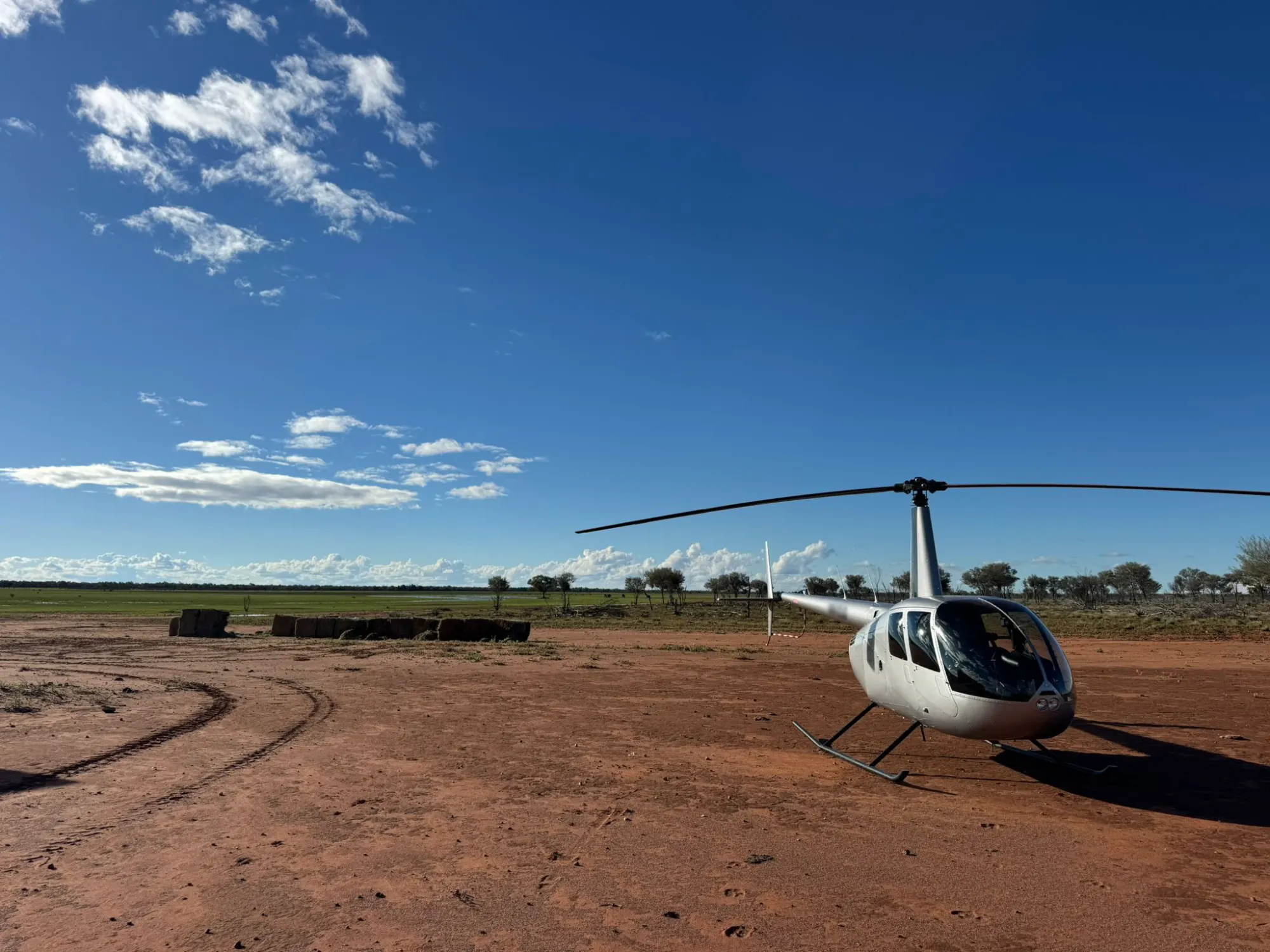 Helicopter on red outback dirt