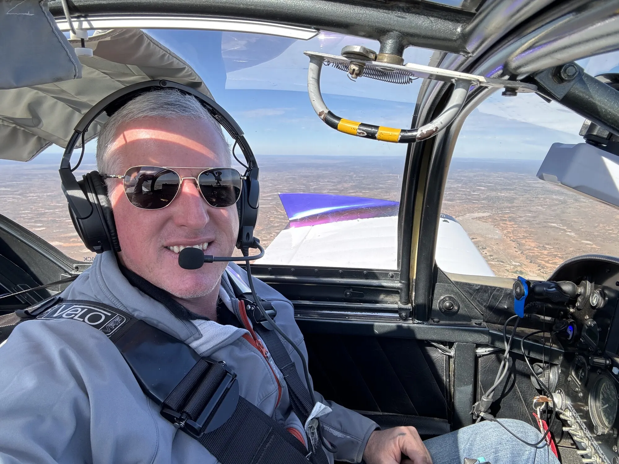 Tim mid-flight in the cockpit on the way to a meeting