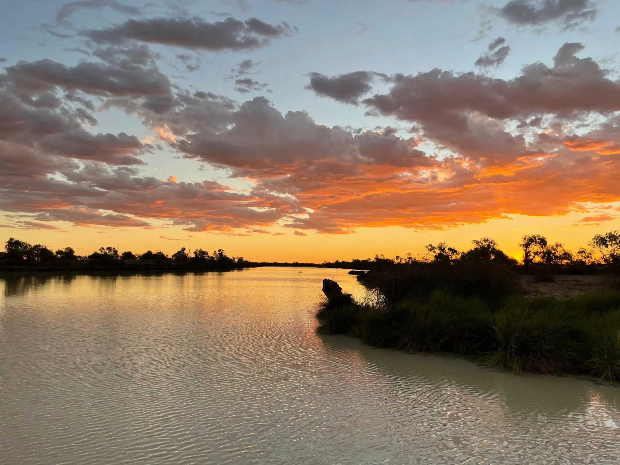 Outback billabong at sunset