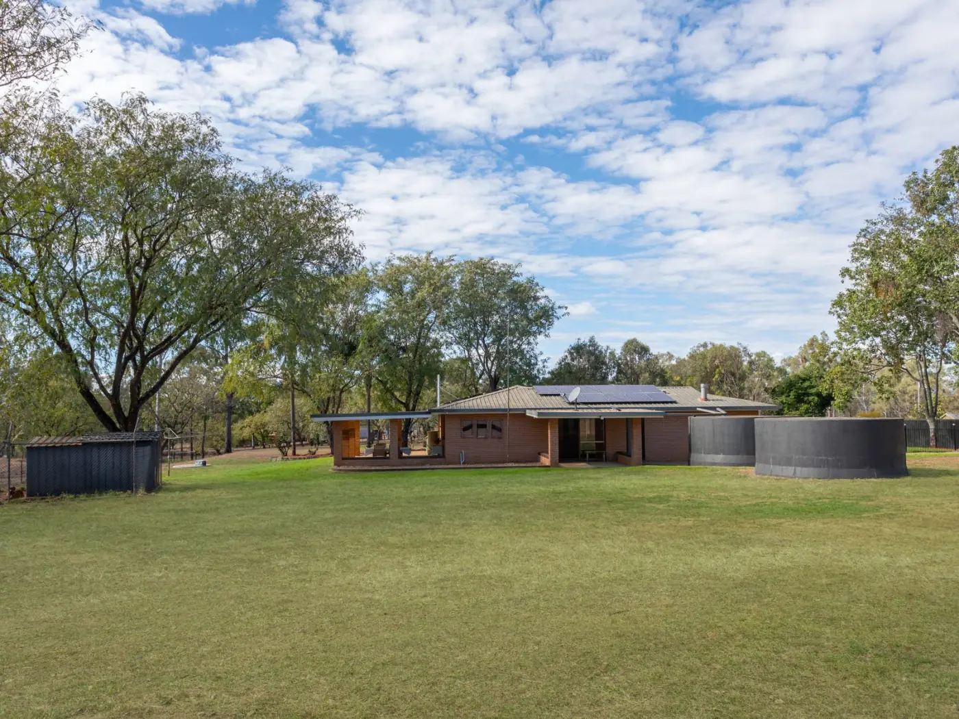 The homestead viewed across the open front paddock